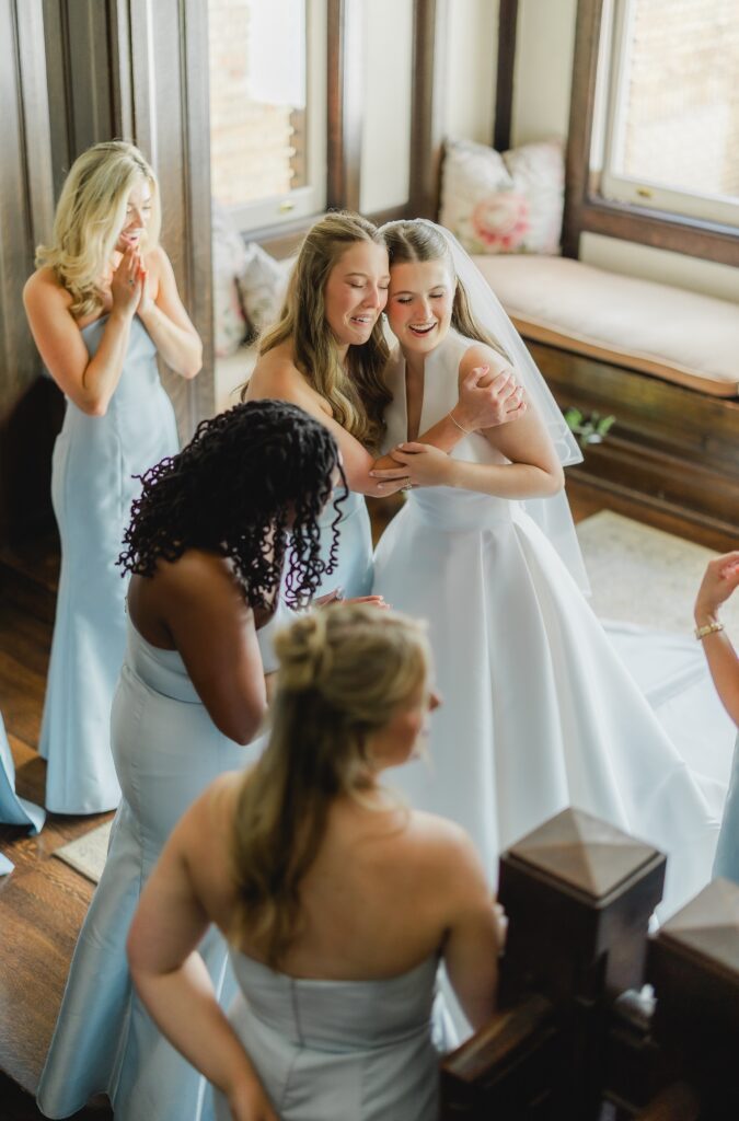 Kendall’s bridesmaids reacting emotionally as they see her in her wedding dress for the first time