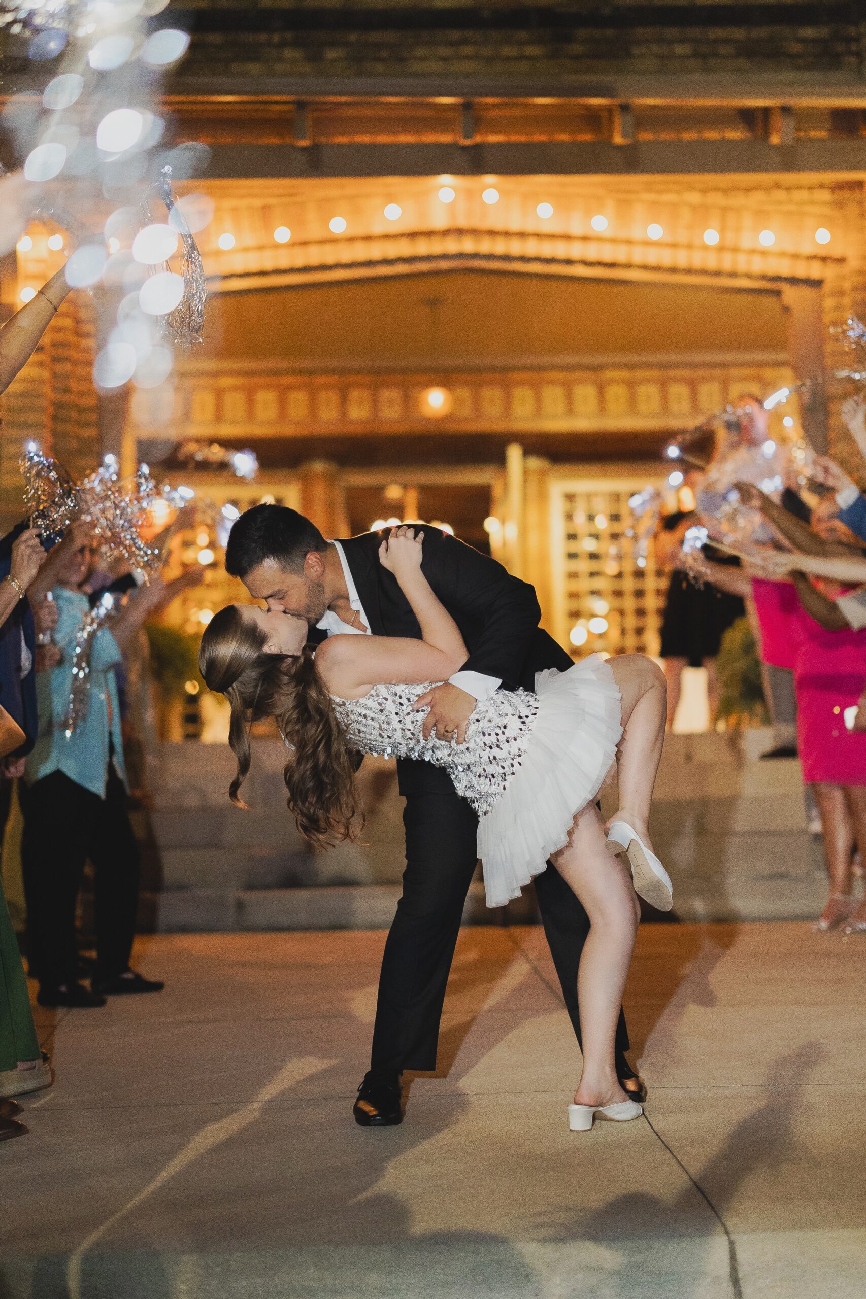 Kendall and Luke leaving their Birmingham wedding reception through a sparkler exit