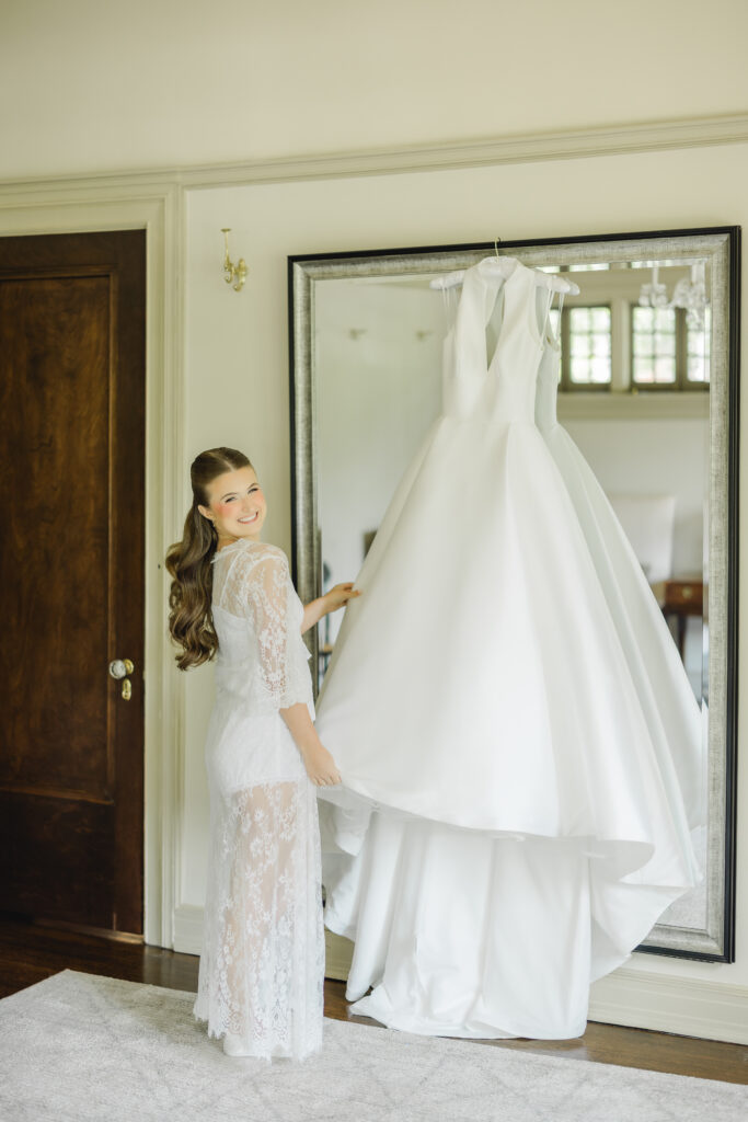 Kendall’s wedding dress hanging at Clubhouse on Highland before her Birmingham wedding