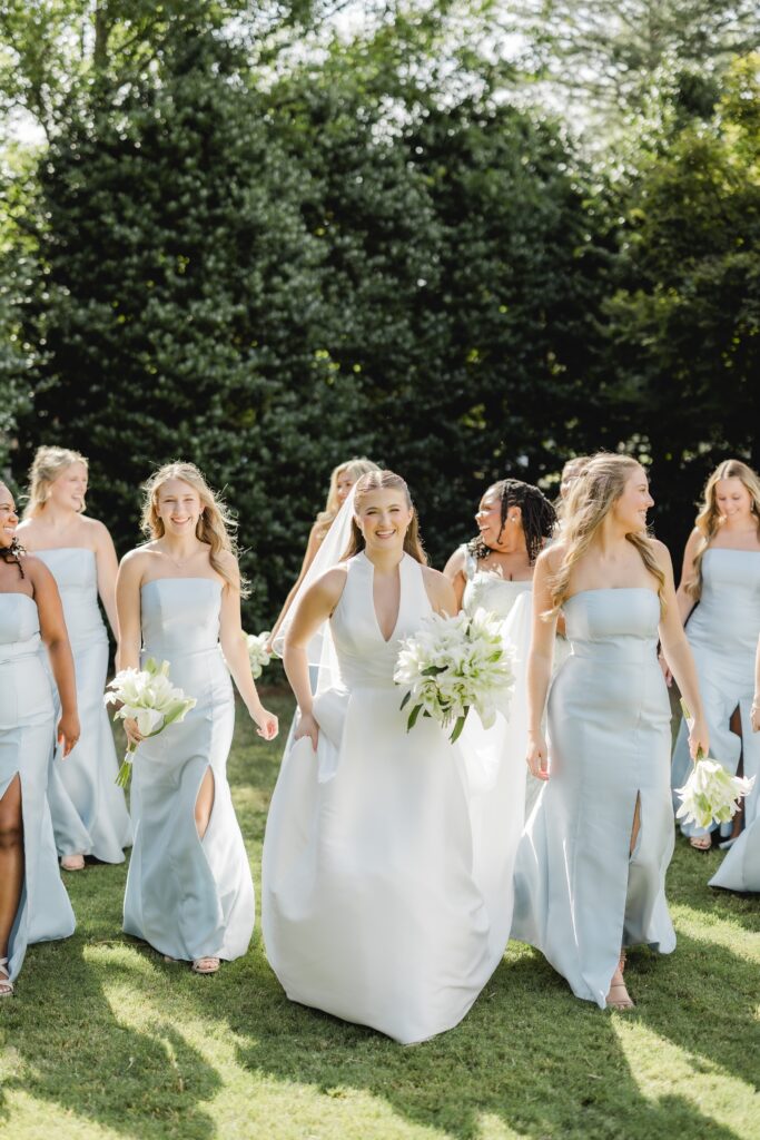 Kendall posing with her bridesmaids outside the chapel during her Birmingham Alabama wedding