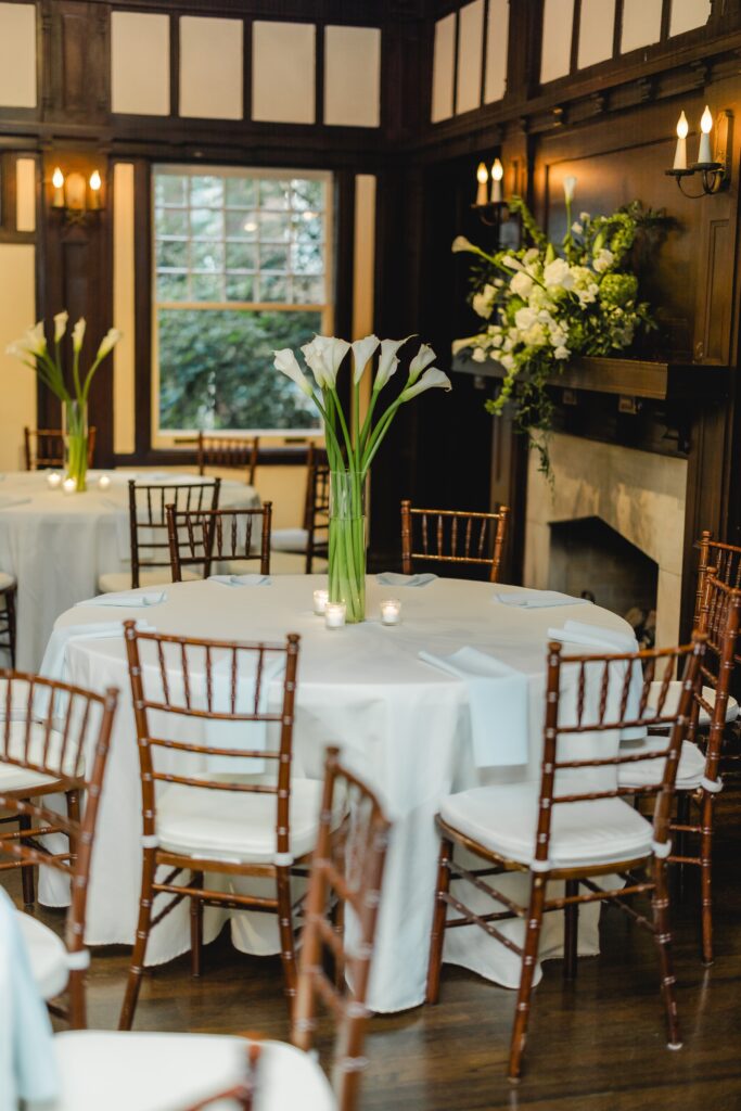 White calla lily floral arrangements decorating Kendall and Luke’s Birmingham wedding reception