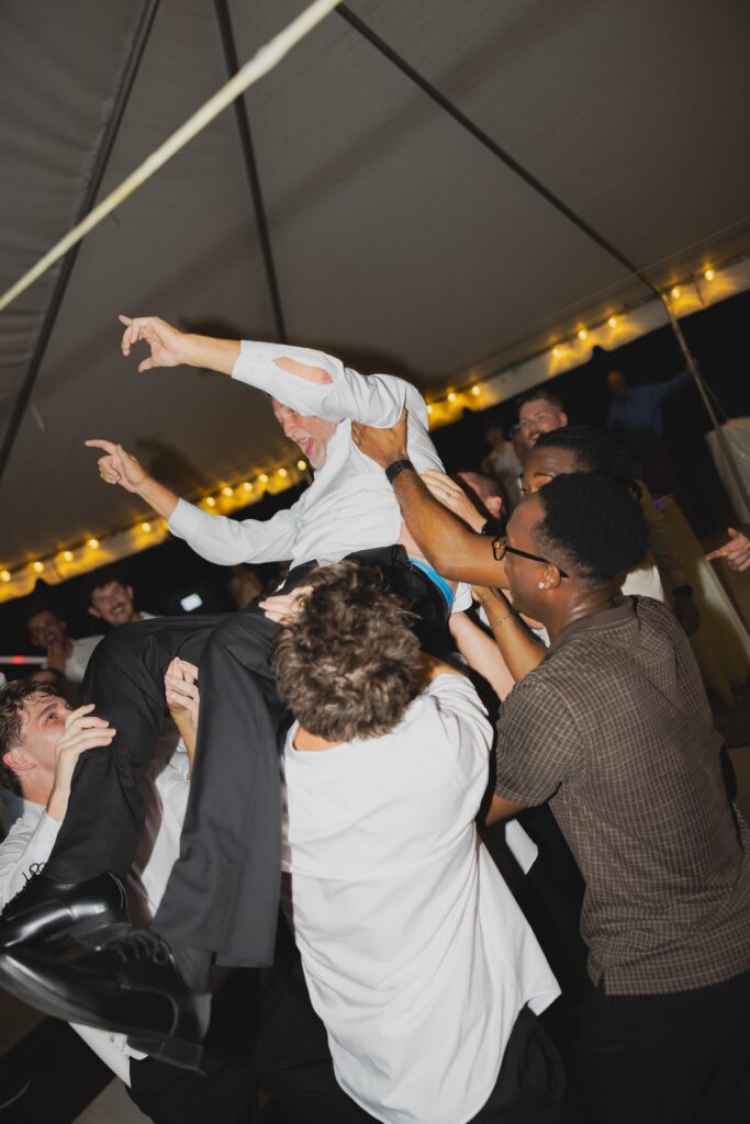 Wedding guests dancing during Kendall and Luke’s Birmingham wedding reception