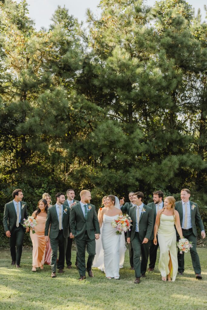 Bride and groom with their wedding party at their Alabama wedding