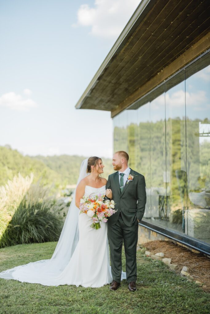 Bride and groom portrait at the Glass House at The Barn at Smith Lake