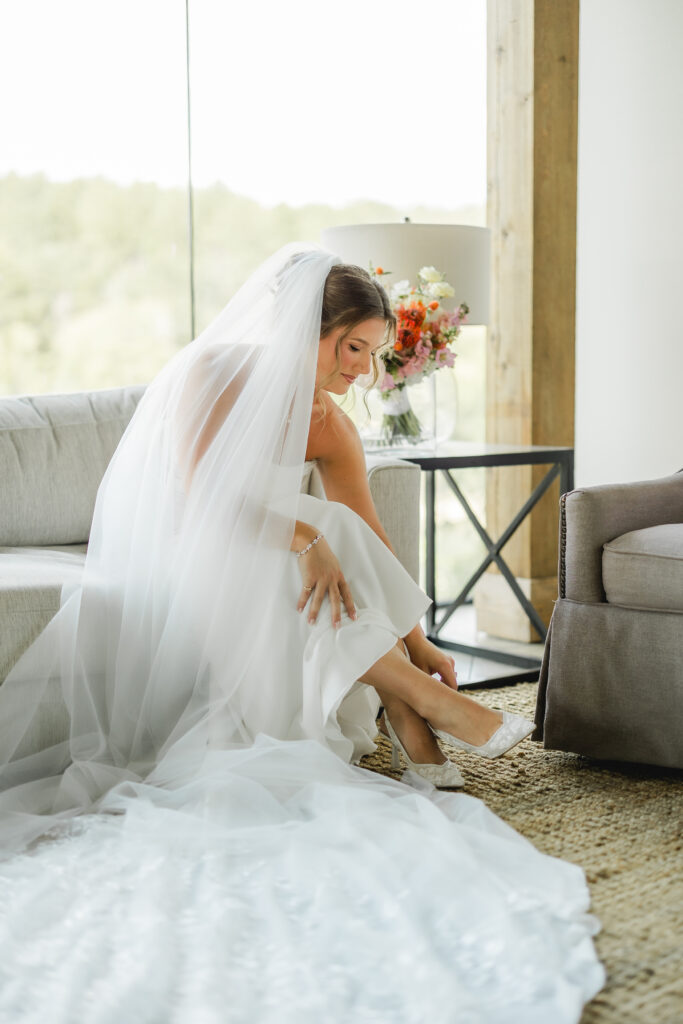 Bride Jess during her wedding day preparations at The Glass House