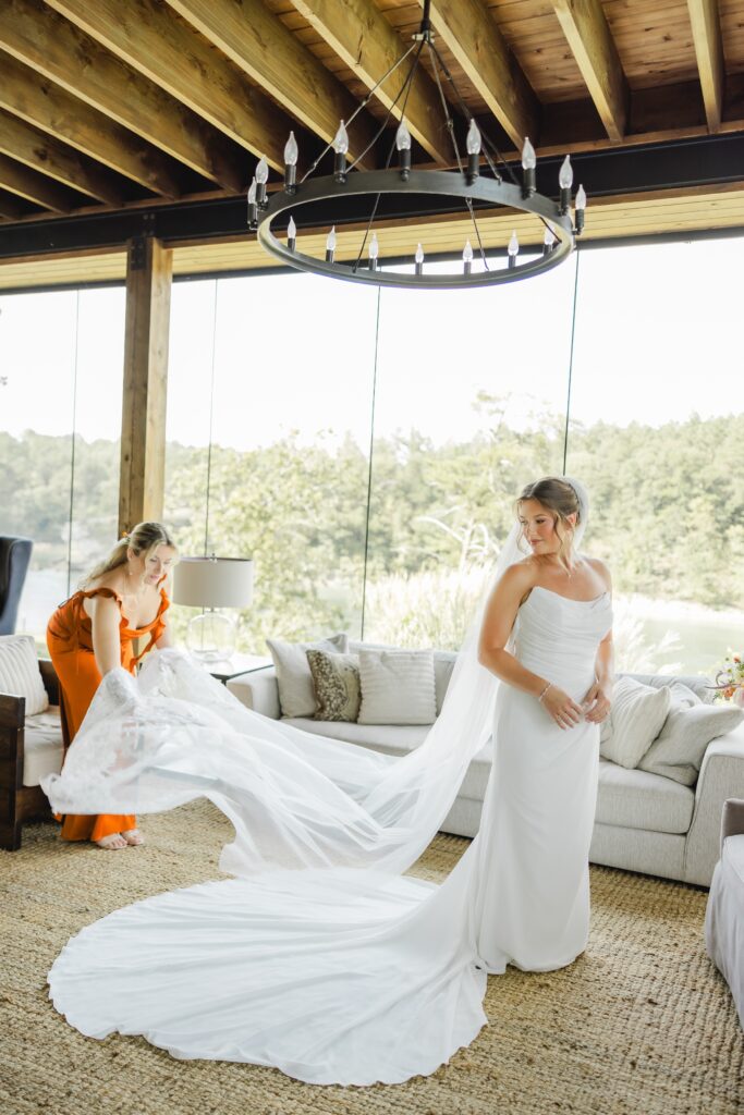 Bride getting ready with her sister and friends at The Barn at Smith Lake