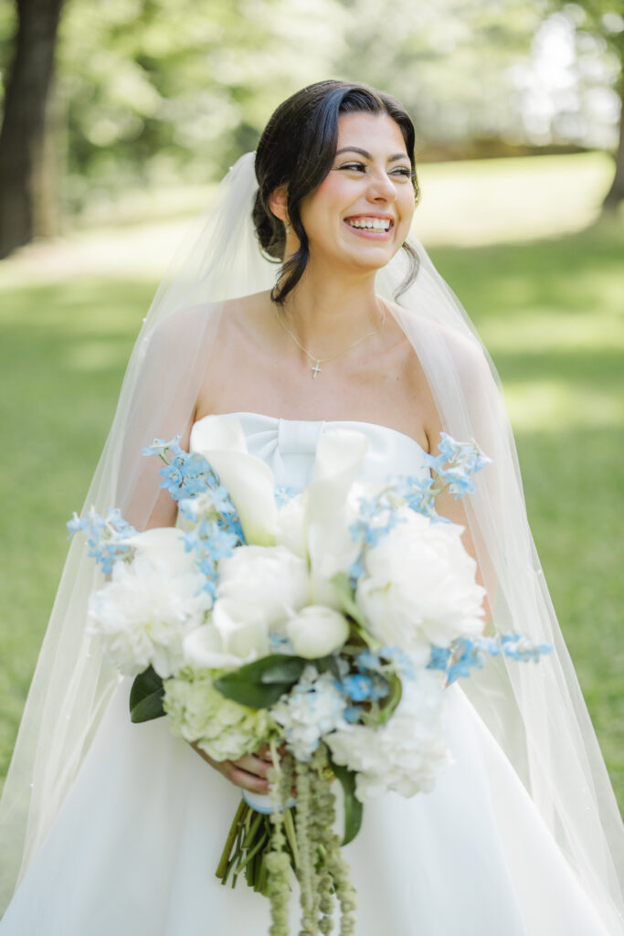 Abby posing for a bridal portrait before the ceremony.