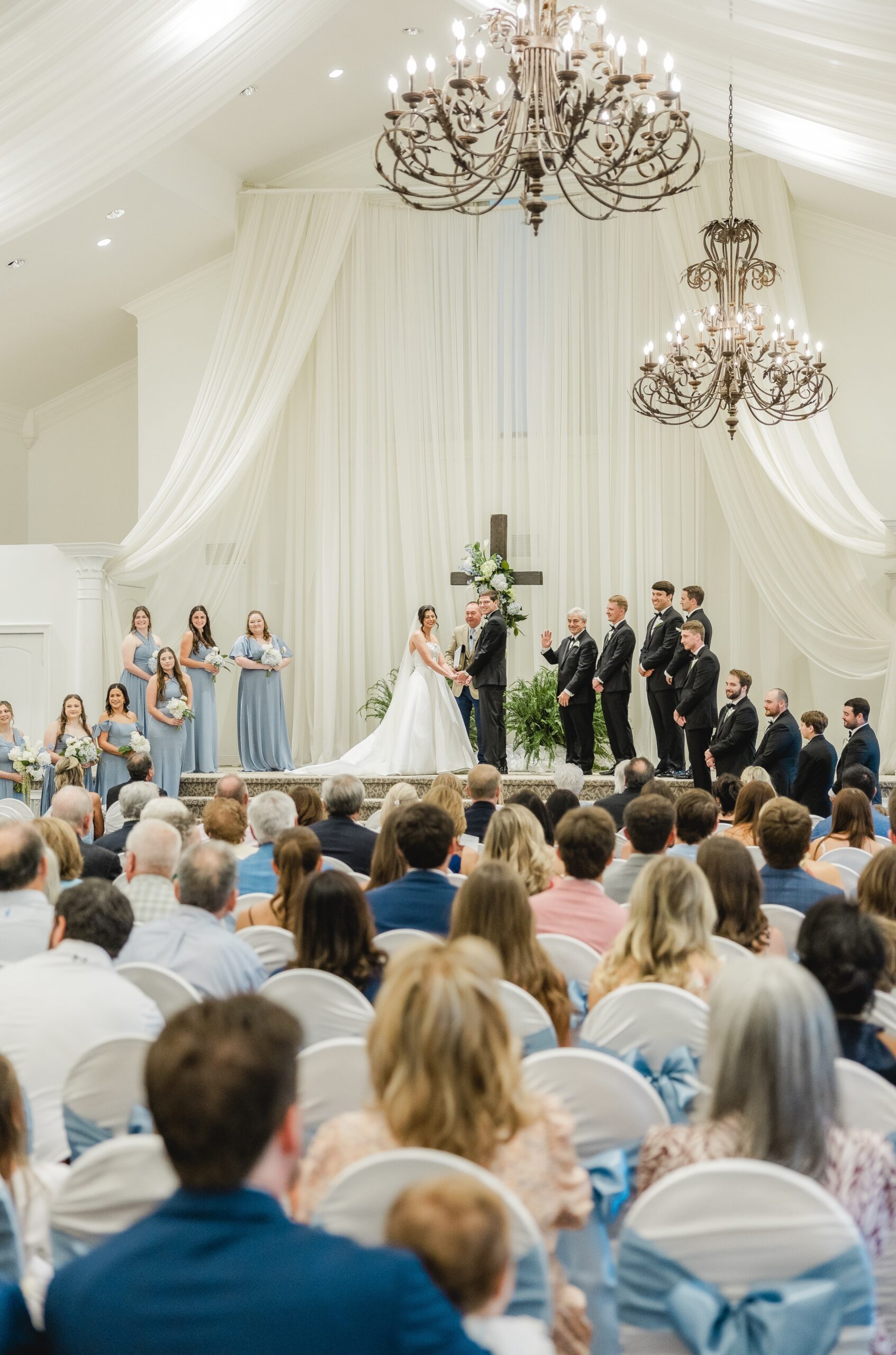 Abby and Jonathan standing together during their wedding ceremony.