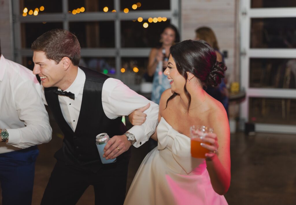 Abby and Jonathan sharing a joyful moment with their guests.