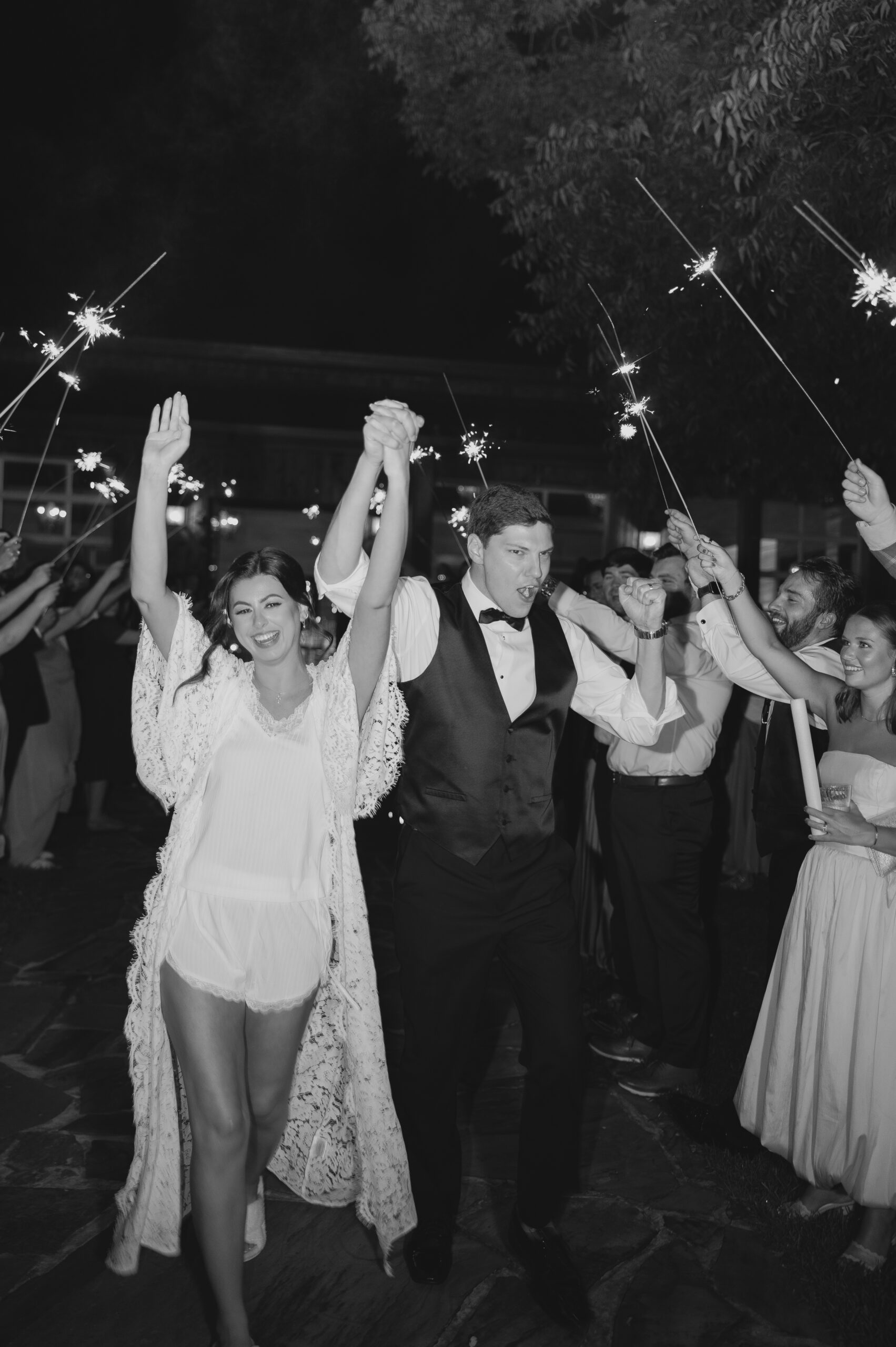 Abby and Jonathan celebrating their wedding day surrounded by family and friends.