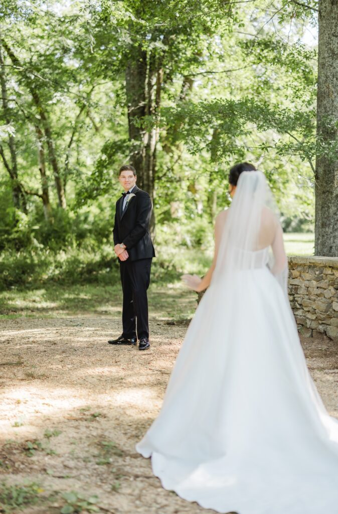 Abby and Jonathan seeing each other for the first time before their wedding ceremony.