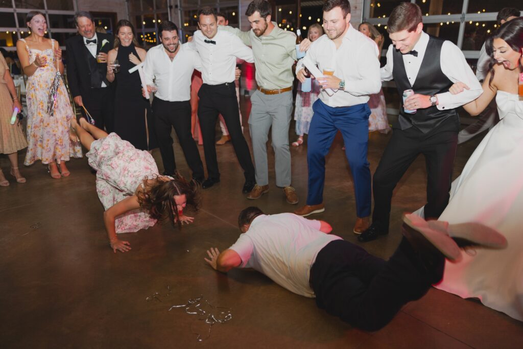 Guests dancing and enjoying the wedding reception at Mathew’s Manor.