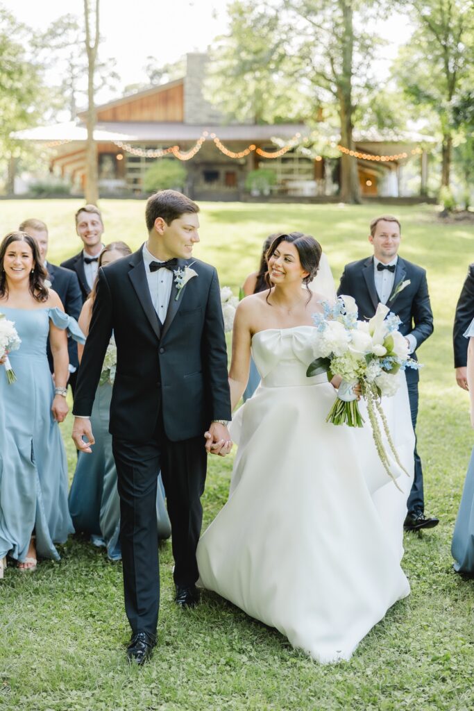 Abby and Jonathan’s wedding party walking together before the ceremony.