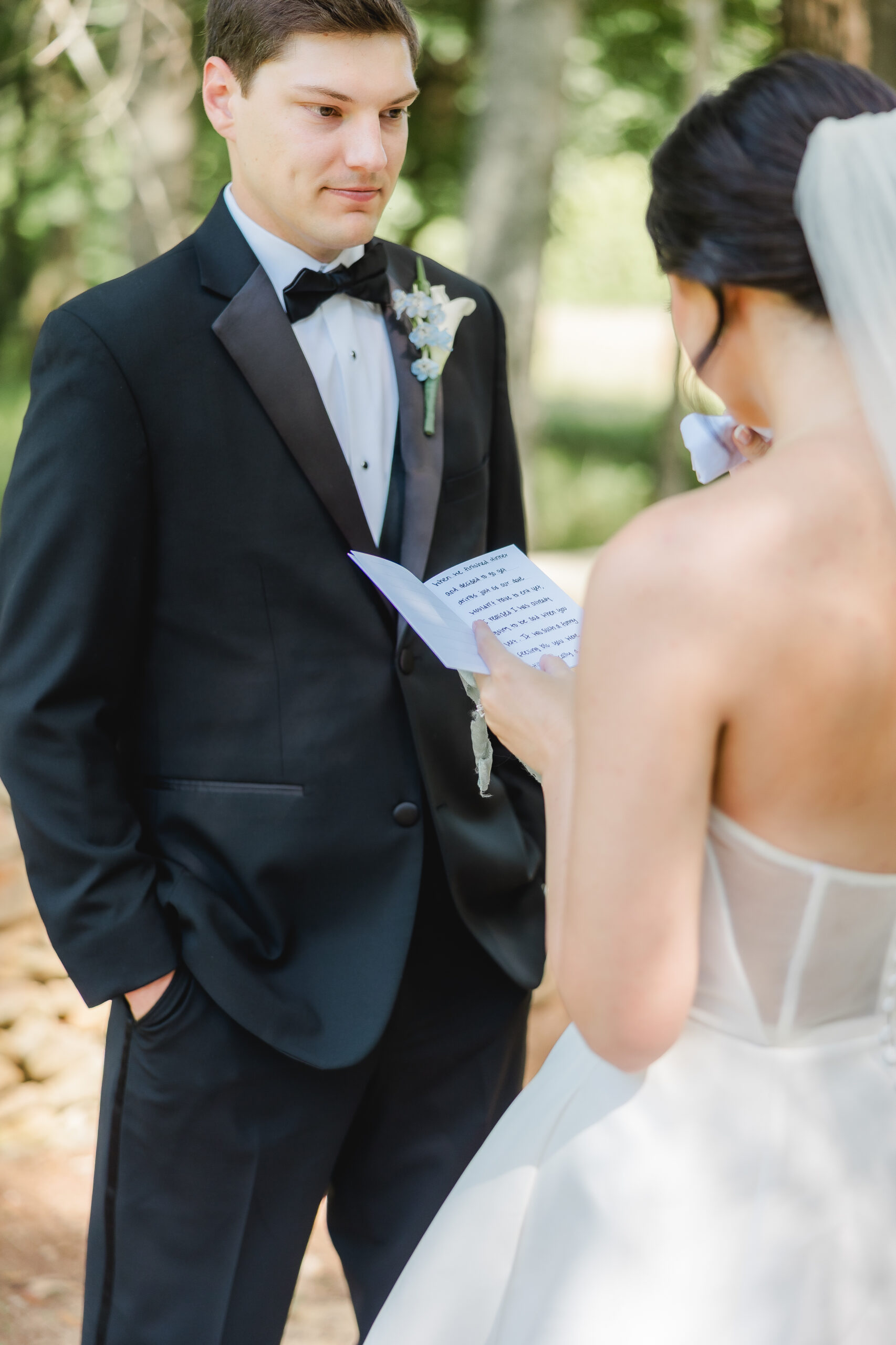 Abby reading her handwritten wedding vows to Jonathan.