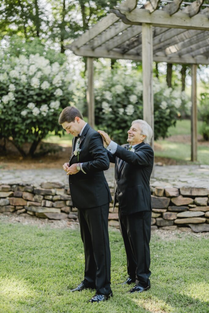 Jonathan’s dad helping him prepare for the wedding day.