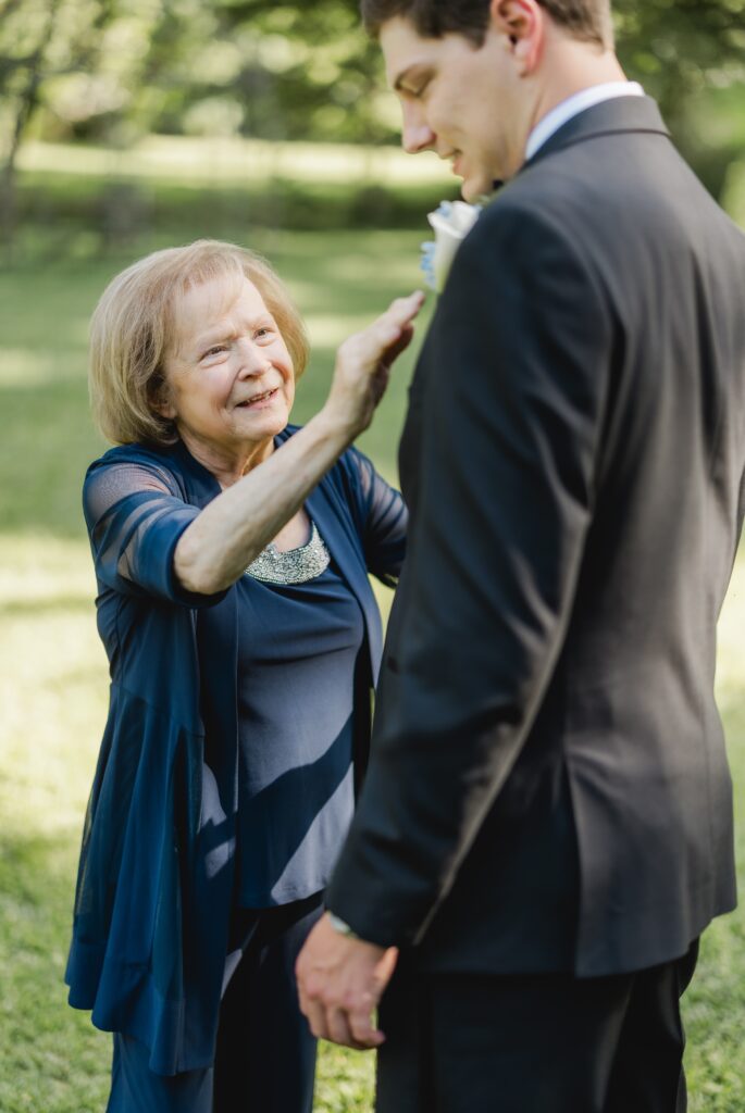Jonathan’s mom helping him get ready for his wedding.