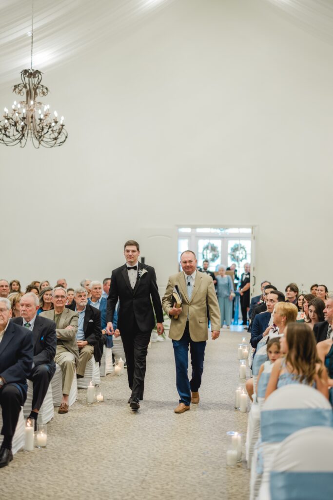 Jonathan walking down aisle during Mathew's Manor wedding ceremony